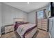 Bedroom with double bed, dresser, and nightstand at 34104 White Fountain Ct, Wesley Chapel, FL 33545