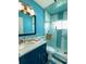 Modern bathroom with updated vanity and a large shower at 3425 96Th N Ter # 4, Pinellas Park, FL 33782