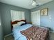 Bedroom with double closet and ceiling fan at 3425 96Th N Ter # 4, Pinellas Park, FL 33782