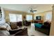 Cozy living room with hardwood floors and a fireplace at 3425 96Th N Ter # 4, Pinellas Park, FL 33782