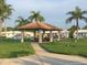 Relaxing community picnic pavilion with tiled roof at 3425 96Th N Ter # 4, Pinellas Park, FL 33782