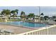 Inviting community pool with surrounding lounge area at 3425 96Th N Ter # 4, Pinellas Park, FL 33782