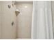 Clean bathroom with shower and tiled walls at 36750 Us Highway 19 N # 13301, Palm Harbor, FL 34684