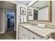 Bathroom with vanity, sink, and marble countertop at 36750 Us Highway 19 N # 13301, Palm Harbor, FL 34684