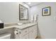 Bathroom with vanity, toilet and marble countertop at 36750 Us Highway 19 N # 13301, Palm Harbor, FL 34684