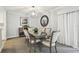Spacious dining area with seating for six and a large mirror at 36750 Us Highway 19 N # 13301, Palm Harbor, FL 34684