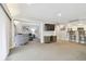Open living space with a view into the kitchen and dining area at 36750 Us Highway 19 N # 13301, Palm Harbor, FL 34684