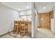 Entryway with view of kitchenette and wood door at 36750 Us Highway 19 N # 15118, Palm Harbor, FL 34684