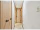 Simple hallway with light walls and wood doors at 36750 Us Highway 19 N # 15118, Palm Harbor, FL 34684