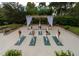 Tranquil outdoor yoga space with a pergola and lush greenery at 36750 Us Highway 19 N # 15118, Palm Harbor, FL 34684