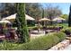Landscaped patio with fountain and comfortable seating at 36750 Us Highway 19 N # 15118, Palm Harbor, FL 34684