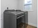 Laundry room with Whirlpool washer and dryer at 5144 13Th S Ave, Gulfport, FL 33707