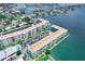 Aerial view of the building and its surroundings, highlighting the waterfront location at 5555 Gulf Blvd # 209, St Pete Beach, FL 33706