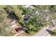 Aerial view of a charming house nestled amongst lush greenery at 5719 23Rd S Ave, Gulfport, FL 33707