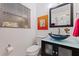 Bathroom boasts a glass shower, vessel sink, and modern vanity at 5719 23Rd S Ave, Gulfport, FL 33707