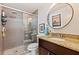 Bathroom with granite vanity and large walk-in shower at 5719 23Rd S Ave, Gulfport, FL 33707