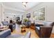 Bright living room features hardwood floors and comfortable seating at 5719 23Rd S Ave, Gulfport, FL 33707