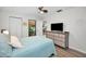 Bedroom with view of living area and built-in dresser at 60 Morning Dove Pl, Oldsmar, FL 34677