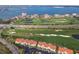 Aerial view of community with golf course and resort in background at 6181 Bahia Del Mar Blvd # 209, St Petersburg, FL 33715