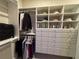 Large walk-in closet with ample shelving and drawers at 6353 Plateau Ct, Bradenton, FL 34203