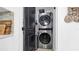Convenient laundry room with stackable washer and dryer at 7209 N Highland Ave, Tampa, FL 33604