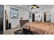 Main bedroom with dresser and plenty of natural light at 7209 N Highland Ave, Tampa, FL 33604