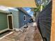 Cozy backyard with a patio, shade sail, and modern fence at 825 46Th N St, St Petersburg, FL 33713