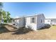 Side view of a mobile home showcasing its exterior at 9790 66Th N St # 231, Pinellas Park, FL 33782