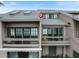 Aerial view of condo building and surrounding landscape at 1111 N Bayshore Blvd # F6, Clearwater, FL 33759