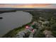 Aerial view of waterfront condo community with pool and lush landscaping at 1111 N Bayshore Blvd # F6, Clearwater, FL 33759