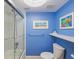 Bright bathroom with walk-in shower and updated fixtures at 1111 N Bayshore Blvd # F6, Clearwater, FL 33759