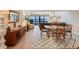 Bright dining room with hardwood floors and a view to the living room at 1111 N Bayshore Blvd # F6, Clearwater, FL 33759