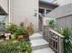 Inviting front entrance with landscaped gardens and stairs at 1111 N Bayshore Blvd # F6, Clearwater, FL 33759