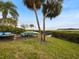 Kayaks on rack near waterfront with lush greenery at 1111 N Bayshore Blvd # F6, Clearwater, FL 33759