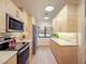 Updated kitchen with stainless steel appliances and light wood cabinets at 1111 N Bayshore Blvd # F6, Clearwater, FL 33759