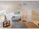 Bright and airy loft space featuring a comfy sofa and large window at 1111 N Bayshore Blvd # F6, Clearwater, FL 33759
