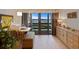 Home office space with water view, a desk and ample storage at 1111 N Bayshore Blvd # F6, Clearwater, FL 33759