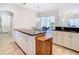 Spacious kitchen with island and access to the backyard at 11620 Eastern Star Ct, New Port Richey, FL 34654