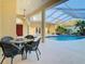 Relaxing pool area with covered patio and seating at 11620 Eastern Star Ct, New Port Richey, FL 34654