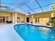 Enclosed pool and patio area with plenty of space for entertaining at 11620 Eastern Star Ct, New Port Richey, FL 34654