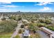 Aerial view showing a home with city skyline in the distance at 1230 32Nd N St, St Petersburg, FL 33713