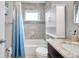 Bathroom with shower/tub combo and granite vanity at 1230 32Nd N St, St Petersburg, FL 33713