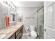Bathroom with granite countertops, toilet and shower at 1230 32Nd N St, St Petersburg, FL 33713