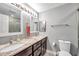 Bathroom with granite countertops and double sinks at 1230 32Nd N St, St Petersburg, FL 33713