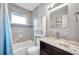 Bathroom with shower/tub combo and granite vanity at 1230 32Nd N St, St Petersburg, FL 33713