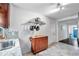 Kitchen with granite countertop and pot rack at 1230 32Nd N St, St Petersburg, FL 33713