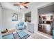 Bright living room with comfy seating and view into kitchen at 1230 32Nd N St, St Petersburg, FL 33713