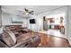 Spacious living room with hardwood floors and sectional sofa at 1230 32Nd N St, St Petersburg, FL 33713