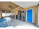 Covered patio with game area and additional seating at 1230 32Nd N St, St Petersburg, FL 33713