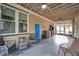 Relaxing screened porch, perfect for outdoor entertaining at 1230 32Nd N St, St Petersburg, FL 33713